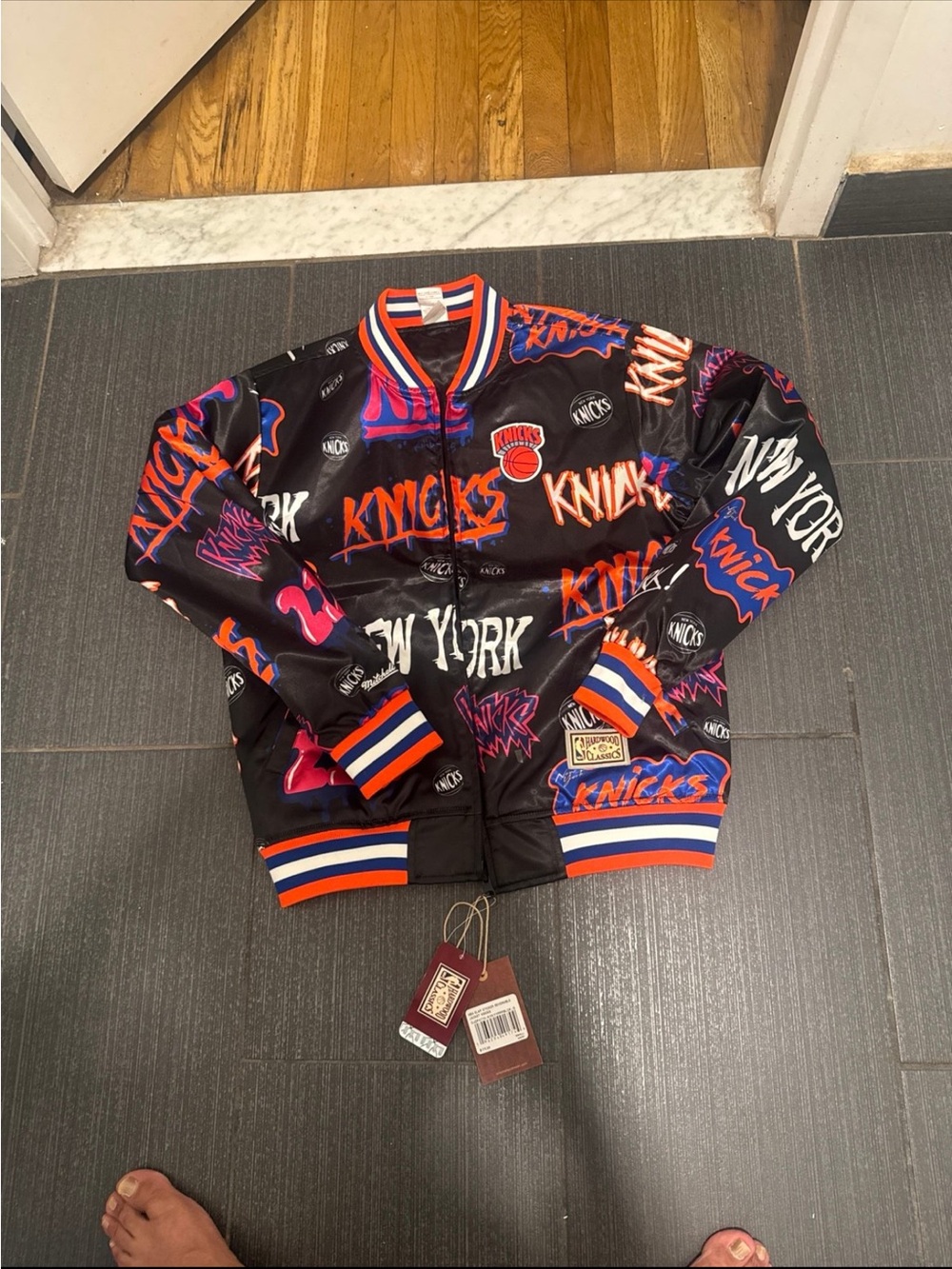 New York Knicks Black Satin Bomber Jacket with Orange & Blue Accents